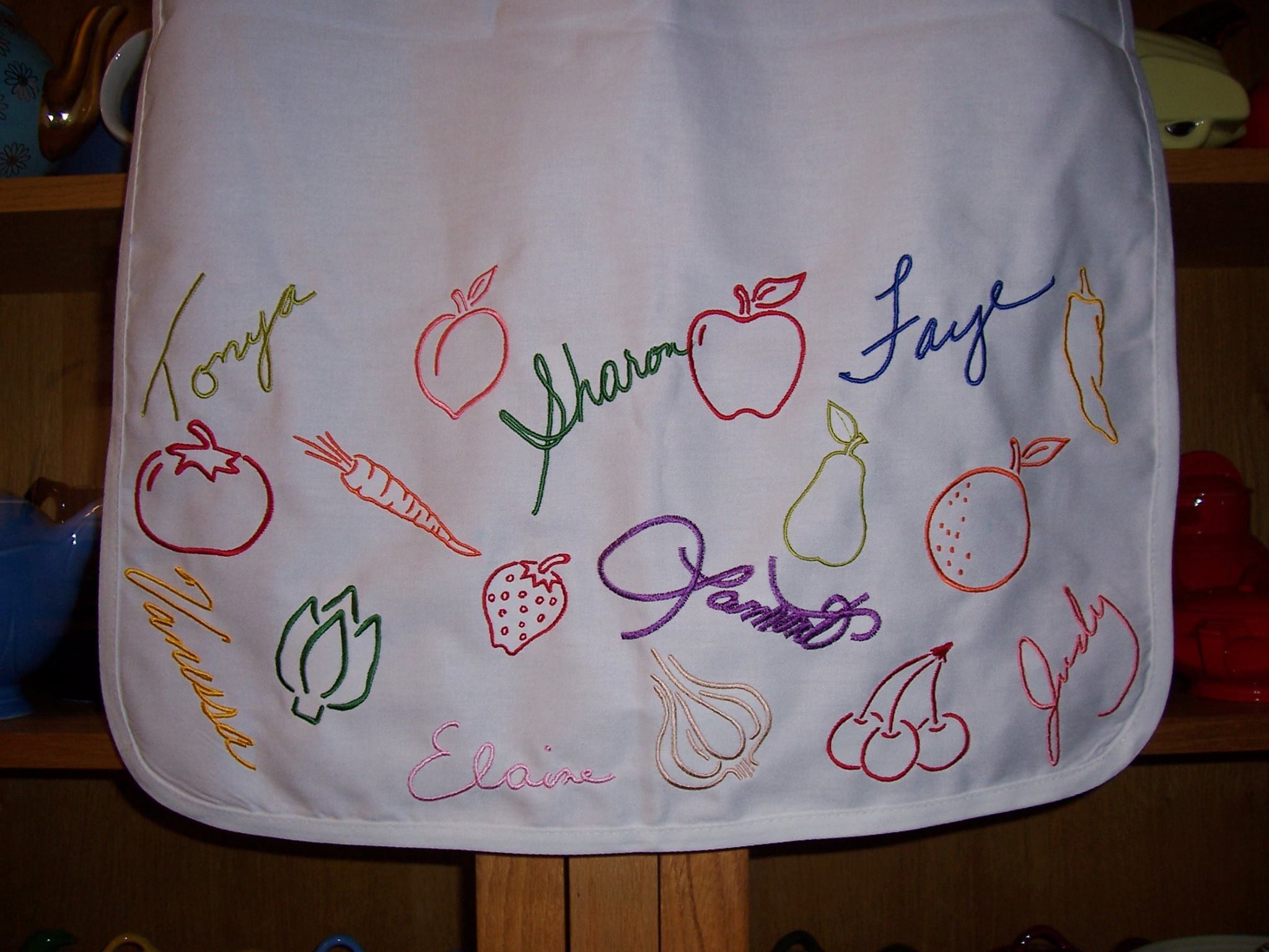 Apron with coworkers' signatures for retirement gift - Closer view of signatures