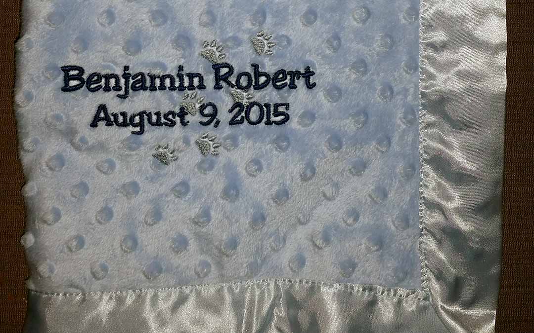 Personalized Baby Blanket embroidered with name, birthdate and paw prints