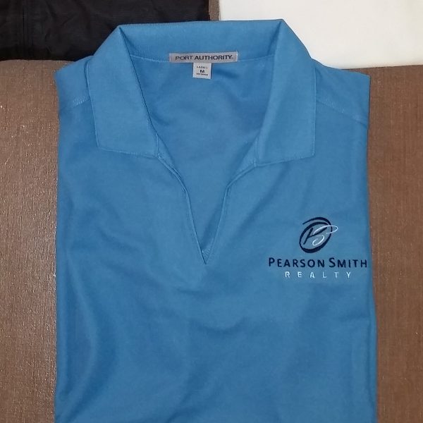 Ladies' Polo Style L572 with the Pearson Smith logo embroidered on the left chest