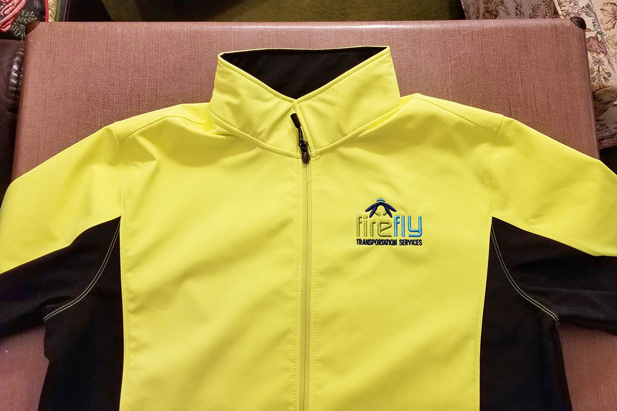 Yellow jacket with Firefly logo embroidered on left chest