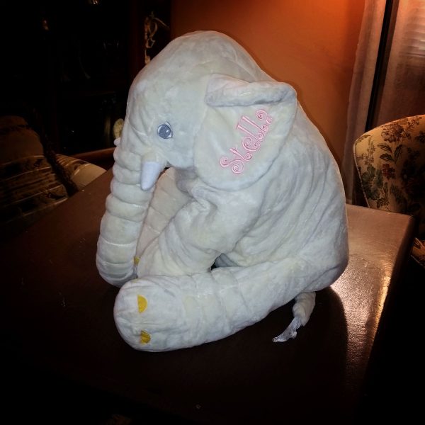 Baby's toy elephant with the name Stella embroidered on its ear