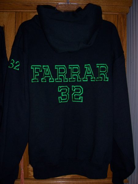 Navy hoodie embroidered on the back with the name Farrar and the number 32
